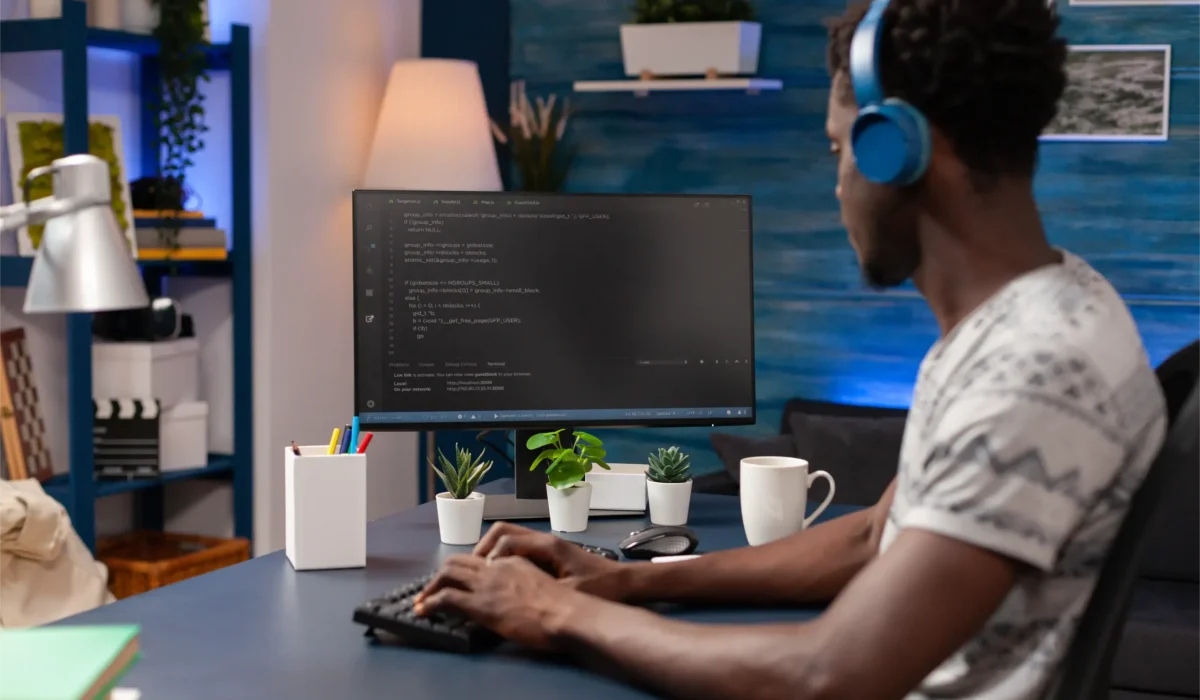 Développeur naviguant entre l'art du code et les impératifs business